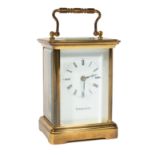 Swiss Brass Carriage Clock for Tiffany , 20th c., dial marked "TIFFANY & Co.", visible escapement,