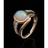 14 kt. Yellow Gold, Opal and Diamond Ring , center bezel set oval cabochon opal, wt. approx. 1.60