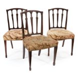 Three Antique Adam-Style Carved Mahogany Side Chairs , each square back with foliate tapered splats,