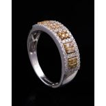 14 kt. White and Yellow Gold and Fancy Diamond Ring , set with 3 clusters of 4 each Fancy Light