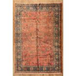 Persian Carpet , red ground, blue border, vining foliate design, 5 ft. 11 in. x 8 ft. 10 in