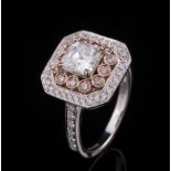 18 kt. White and Rose Gold and Diamond Ring , center prong set cut cornered square modified