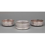 Group of Antique and Vintage English Silverplate Wine Coasters , incl. pair with gadroon borders,