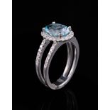 Platinum, Aquamarine and Diamond Ring , center prong set oval brilliant cut crown and modified