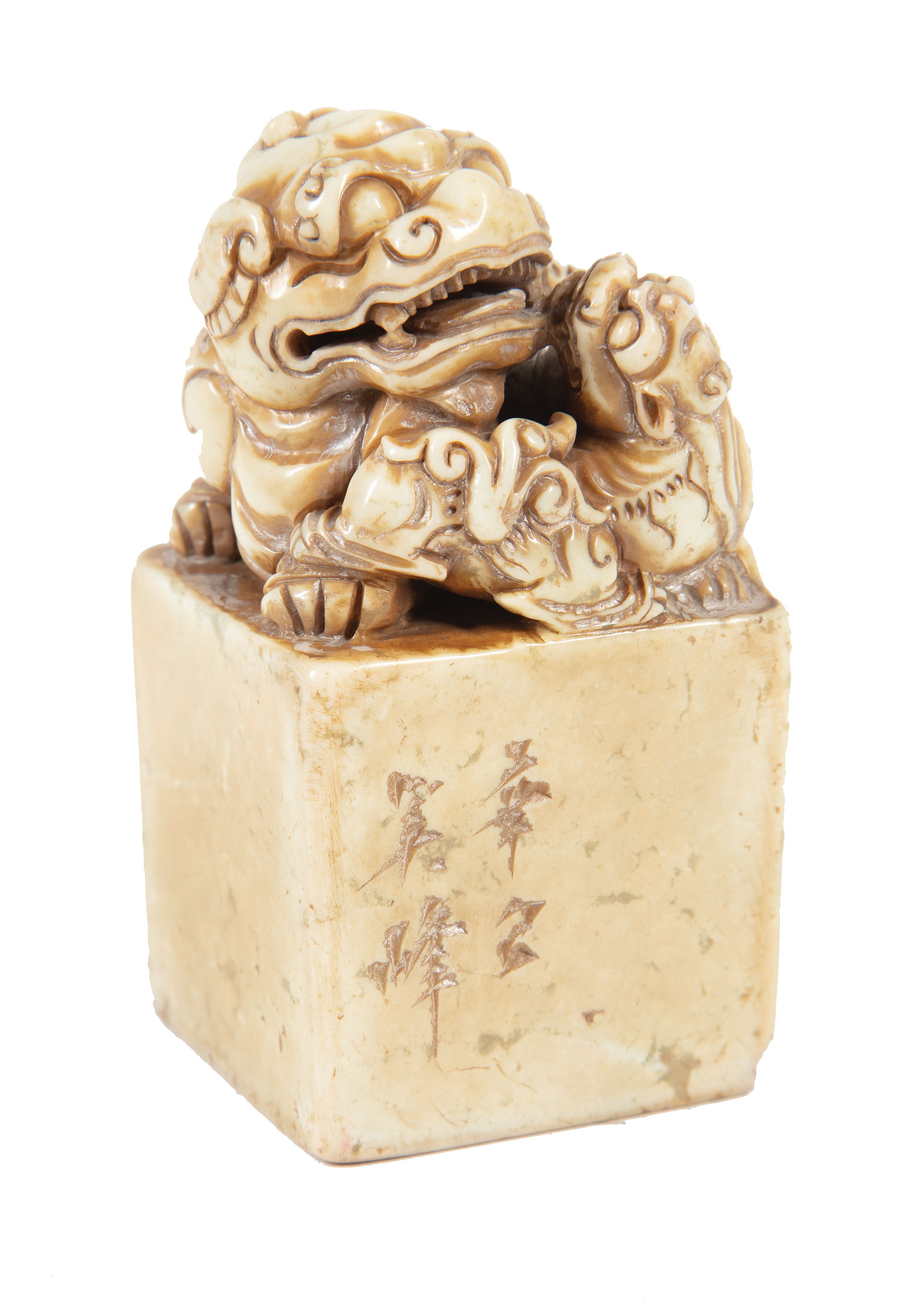 Chinese Soapstone Seal , carved with a Buddhist lion cradling its cub, carved chop, h. 3 1/2 in., w.