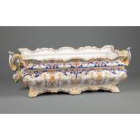 French Polychrome Porcelain Jardiniere , scalloped rim, scroll handles, h. 7 1/4 in., w. 21 3/4 in.,