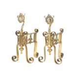 Pair of Aesthetic Movement Brass Fire Tool Rests , c. 1895, stylized flower finials, h. 12 1/2