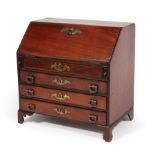 Antique Miniature Mahogany Slant-Front Desk , fitted interior, four drawers, shaped bracket feet, h.