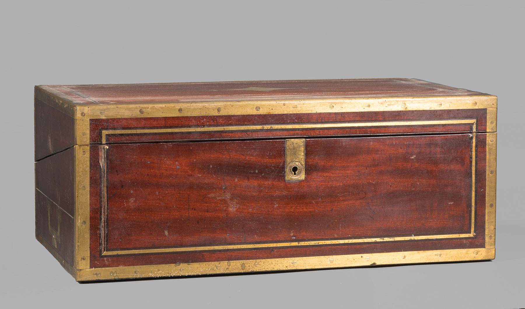 Regency Brass-Bound Mahogany Lap Desk , early 19th c., lid with decorative cartouche, fitted