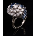 14 kt. White Gold, Sapphire and Diamond Fan-Shape Cluster Ring , set with 14 marquise cut blue