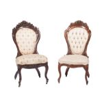 Two American Rococo Carved and Laminated Rosewood Side Chairs , mid-19th c., attr. to John Henry