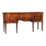 George III Inlaid Mahogany Sideboard , late 18th/early 19th c., serpentine top, fitted frieze