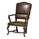 Italian Leather and Walnut Fauteuil a Cremaillere , 18th c., shaped reclining back, carved knees,