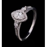 18 kt. White Gold and Diamond Ring , center prong set marquise shape brilliant cut diamond, wt. 0.50