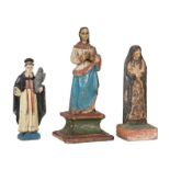 Three Spanish Colonial Carved and Polychrome Wood Figures of Saints , 18th/19th c., tallest h. 16 in