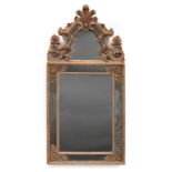 Regence-Style Carved and Gilded Pier Mirror , arched foliate crest with central shell, segmented