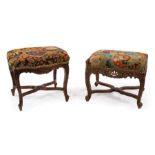 Two Louis XV-Style Carved Walnut Stools , foliate and shell carved aprons, needlepoint cushion
