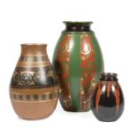 Three Art Deco Emile Lombart for St. Ghislain Pottery Vases , c. 1935, incl. brown ground, signed "