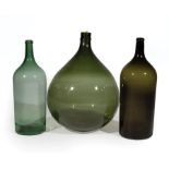 French Green Glass Demijohn and Two Tall Bottles , 19th c., tallest h. 27 in., dia. 18 in