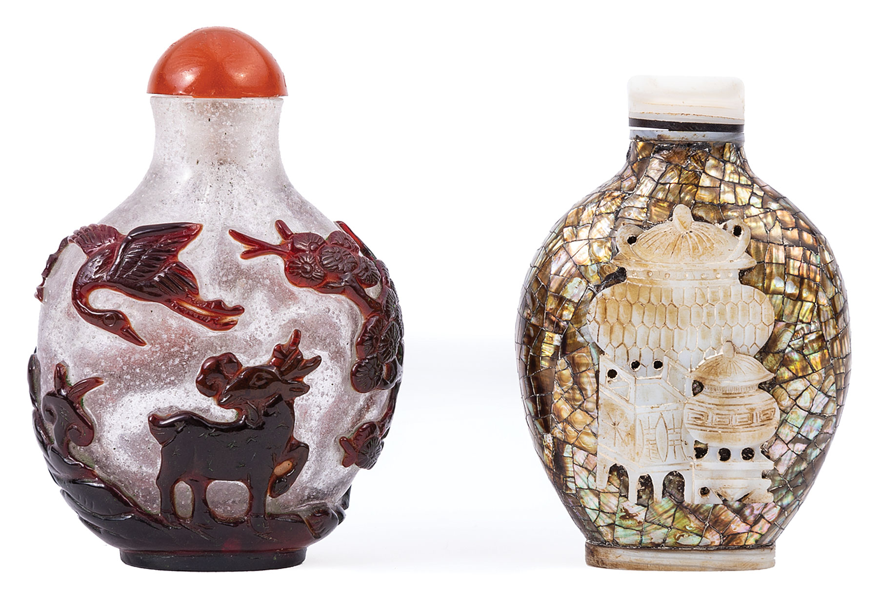 Two Chinese Snuff Bottles , incl. red overly bubble-suffused clear glass carved with deer and