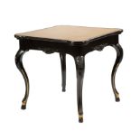 Continental Rococo-Style Ebonized and Parcel Gilt Games Table , tooled leather top, slide out chip