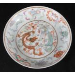 A late 19th/early 20th century Chinese famille rose dish, decorated with polychrome enamels, central