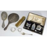 A small collection of assorted silver items including a cased three-piece cruet set by William Neale