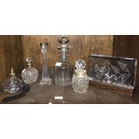 A small collection of assorted glass items comprising two silver collared toilette jars, a Caithness