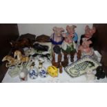 SECTION 4. A set of five Wade ceramic Natwest piggy banks, together with a Royal Dux figure group of