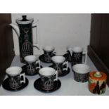 SECTION 20. A Portmeirion pottery 'Magic City' coffee set comprising six cups and saucers, coffee