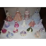 SECTION 16. Four large Coalport porcelain figures 'Louisa', 'Lily', 'Lady Harriet' and 'Lady in