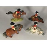 A collection of four Norman Thelwell Beswick Horse & Rider figures including 2 x 'Kick Start' in