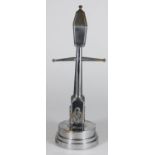 A novelty chromium-plated brass 'Trench Art' lamppost table lighter, the pedestal base of the