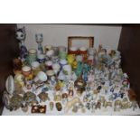 SECTION 7. A large collection of novelty egg cups together with Wade whimsies, miniature Sylvac