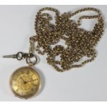 A 14k open-faced pocket watch, gilt engraved dial with black Roman numerals, ornately engraved back,