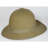 A Khaki Pith Helmet by J. Compton Sons & Webb, London, size 6 and 7/8