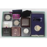 Four various limited-edition silver commemorative medals, in fitted boxes with certificates,