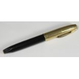 A gold-plated 'white dot' Sheaffer fountain pen with 14ct gold nib, made in USA