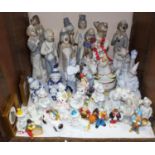 SECTION 24. A large quantity of porcelain clowns including Casades figurines, a musical clown,