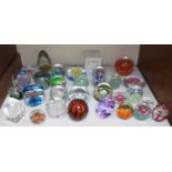 SECTION 2. A collection of 29 assorted glass paperweights including examples by Murano, Selkirk