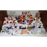 SECTION 11. A quantity of Staffordshire pottery dogs including a pair of Dalmatian pen holders, a