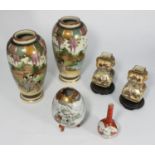 Six items of Japanese Satsuma pottery comprising a pair of small double gourd vases, of square