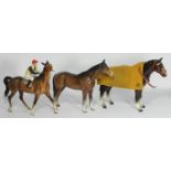 A Beswick ceramic Racehorse and Jockey (Walking Racehorse) Numbered 24 to Saddle-cloth, jockey in