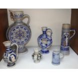 SECTION 13. Six assorted salt-glazed pottery jugs including a large German example with blue