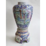 A large Chinese porcelain temple vase of ovoid form with matching shaped and pierced porcelain