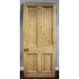 Two Victorian pine four panel doors, the larger plain and the smaller painted white, largest