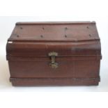 A large 'wood effect' twin-handled tin travelling trunk, with stud and banding detail, 76 x 55cm