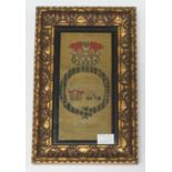A framed and glazed embroidered silk panel depicting a Royal crest, reputedly from William IV's