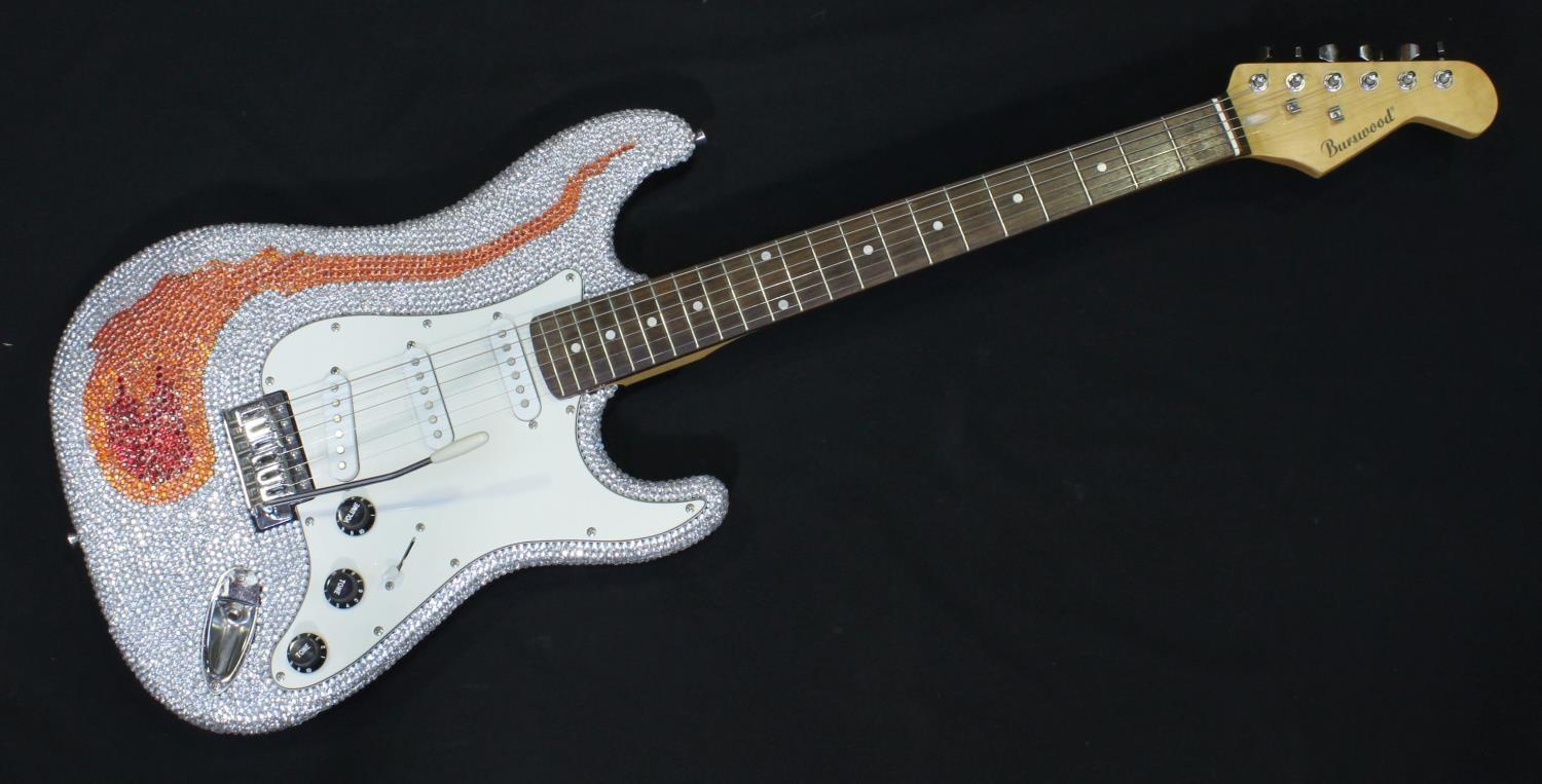 A Burswood Stratocaster style electric guitar with three single-coil pickups, white scratch plate,
