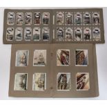 A quantity of collector's cigarette and tea cards including full sets of footballers by Wills,
